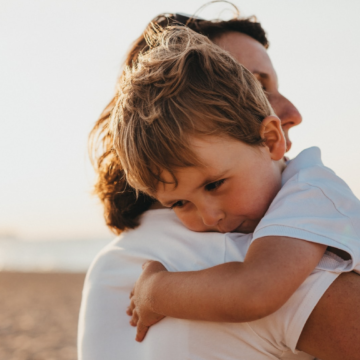 boy hugging mom